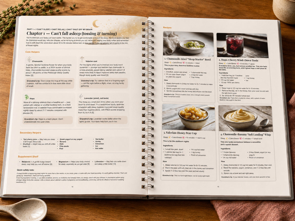 Open cookbook on a wooden surface with text and images of food for sleep.